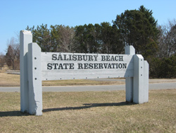 the entrance sign for Salisbury Beach State Reservation